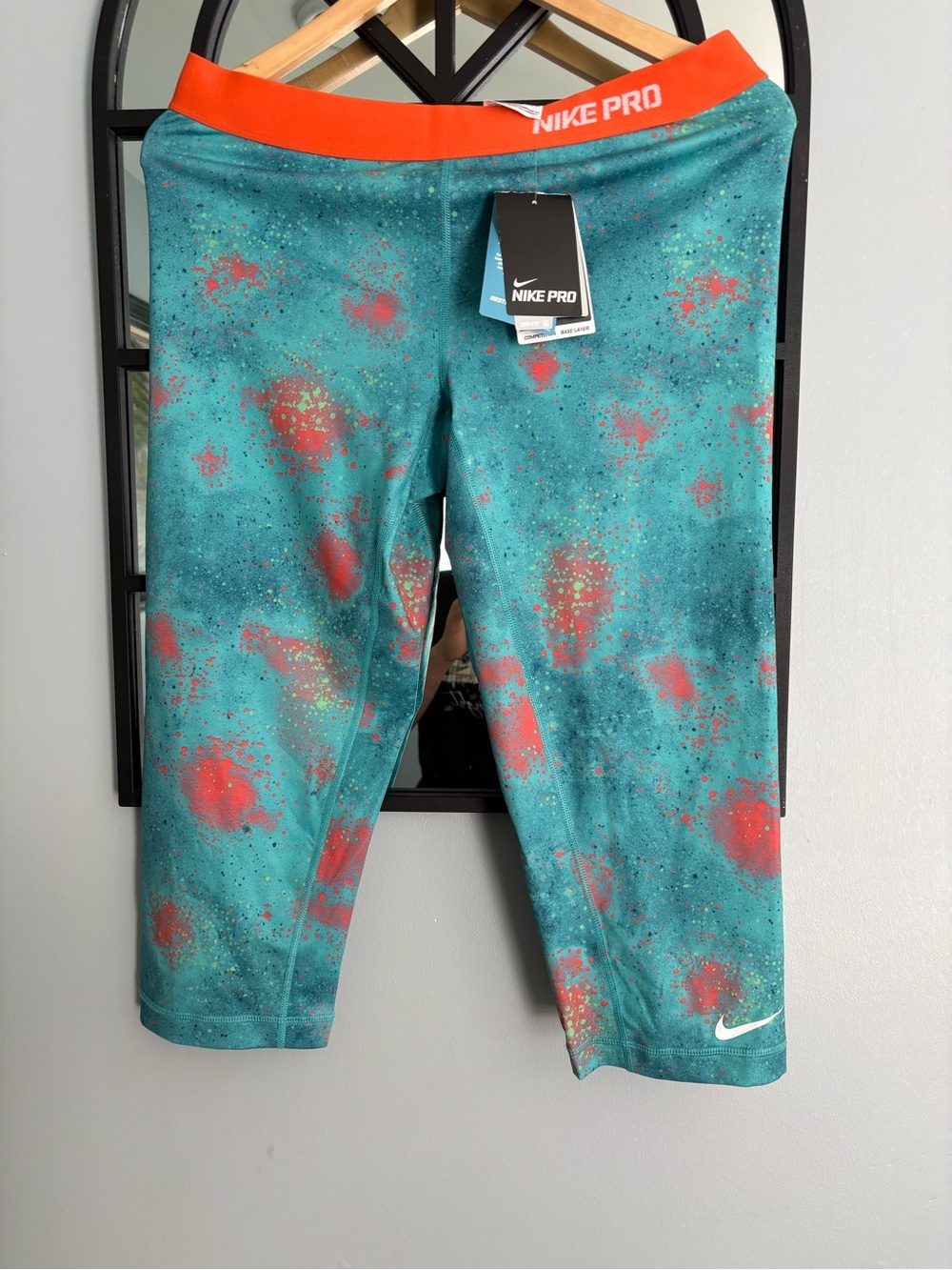 Nike ' Teal with Red Accent Performance Capri Leggings